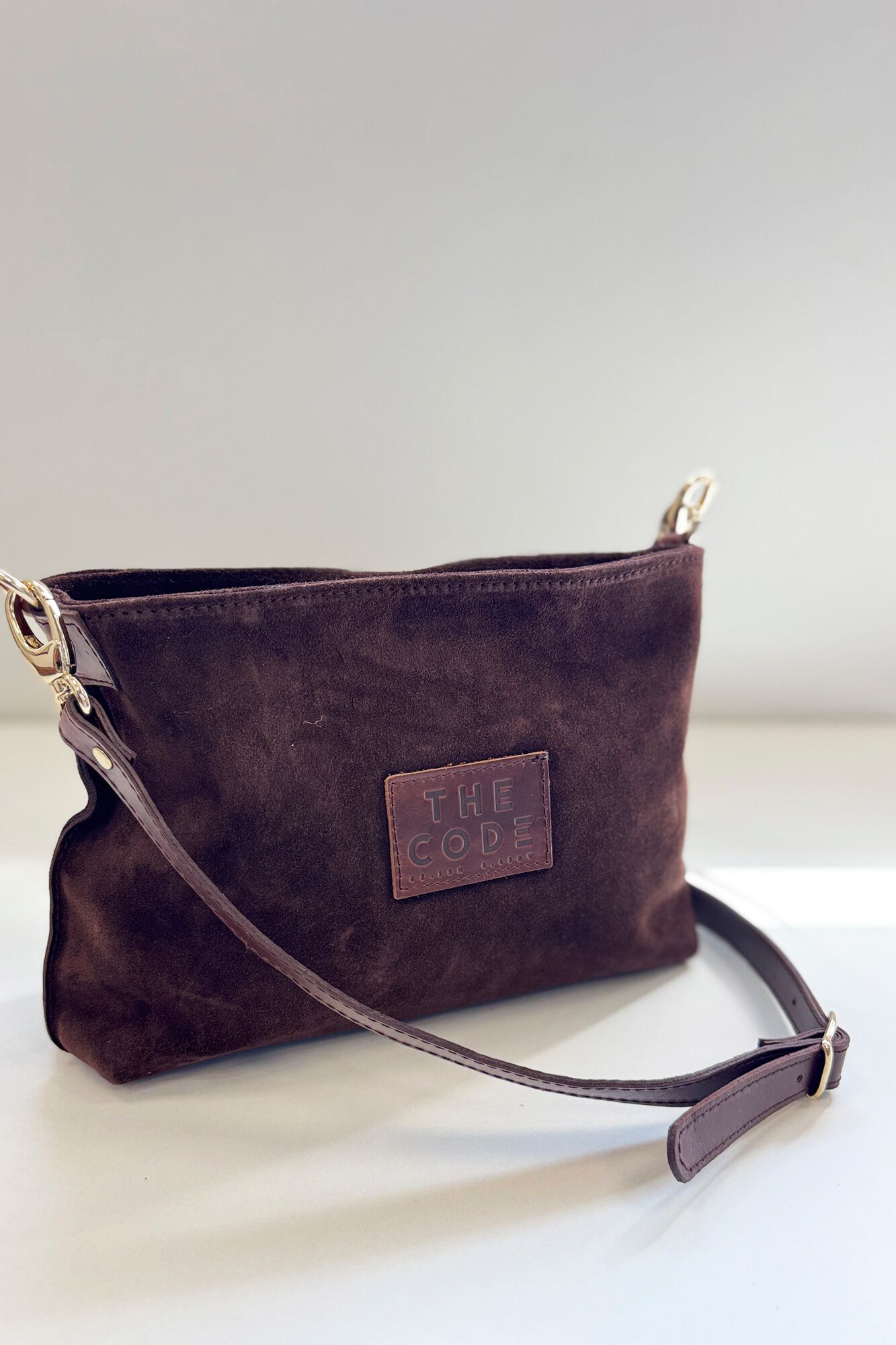 The Code Suede Dakota crossbody Dark brown