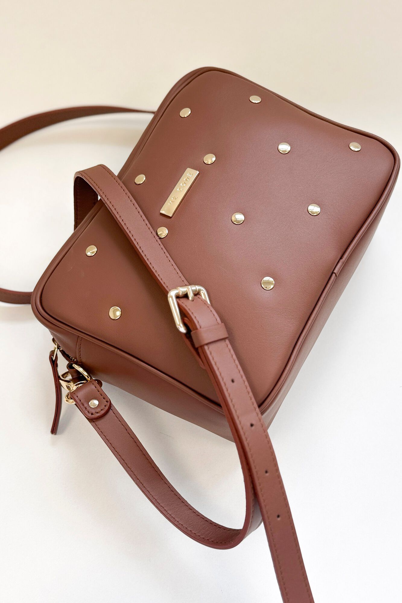 The Code Charlotte leather and stud crossbody Brown
