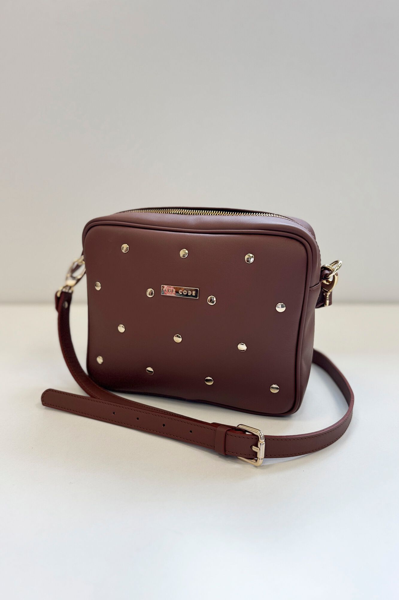 The Code Charlotte leather and stud crossbody Brown