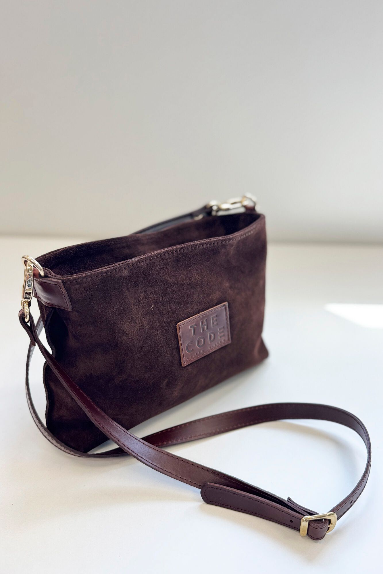 The Code Suede Dakota crossbody Dark brown