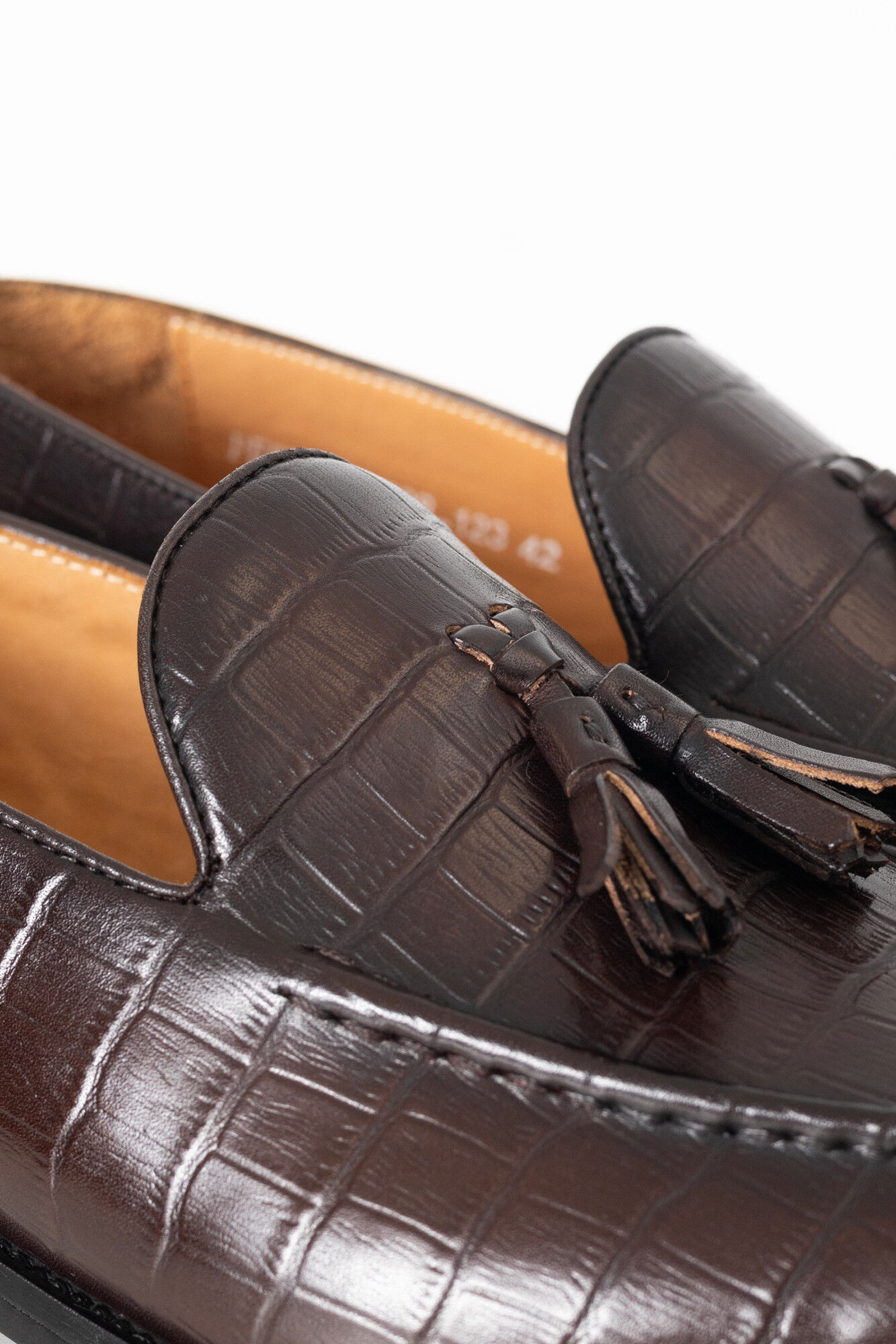 PuroEGO Mocassim em pele com borlas estampado Castanho