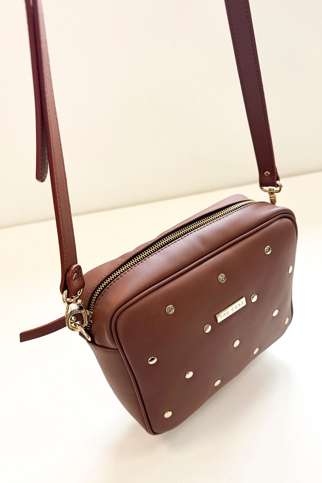 The Code Charlotte leather and stud crossbody Brown